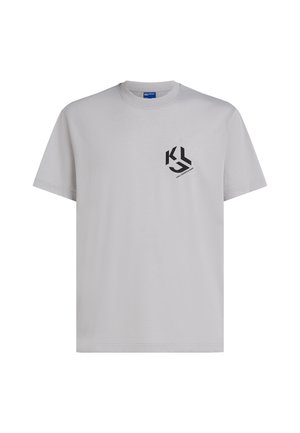 Vaaleanharmaa pyöreäkauluksinen T-paita, jossa on lyhyet hihat ja vasemmassa rintakehässä pieni musta "KL"-logo.