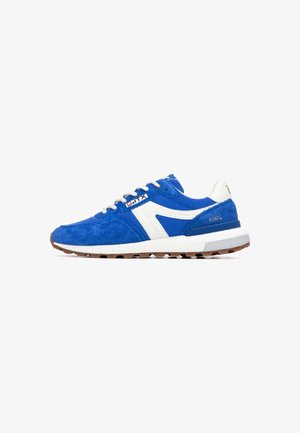 Zapatillas de ante azul y material sintético con detalles blancos, que presentan una puntera redonda, cierre de cordones y una suela de goma texturizada color goma.