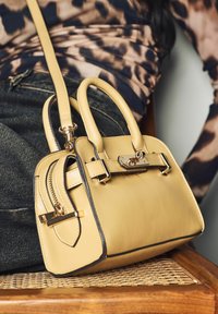 Next Torbica - yellow