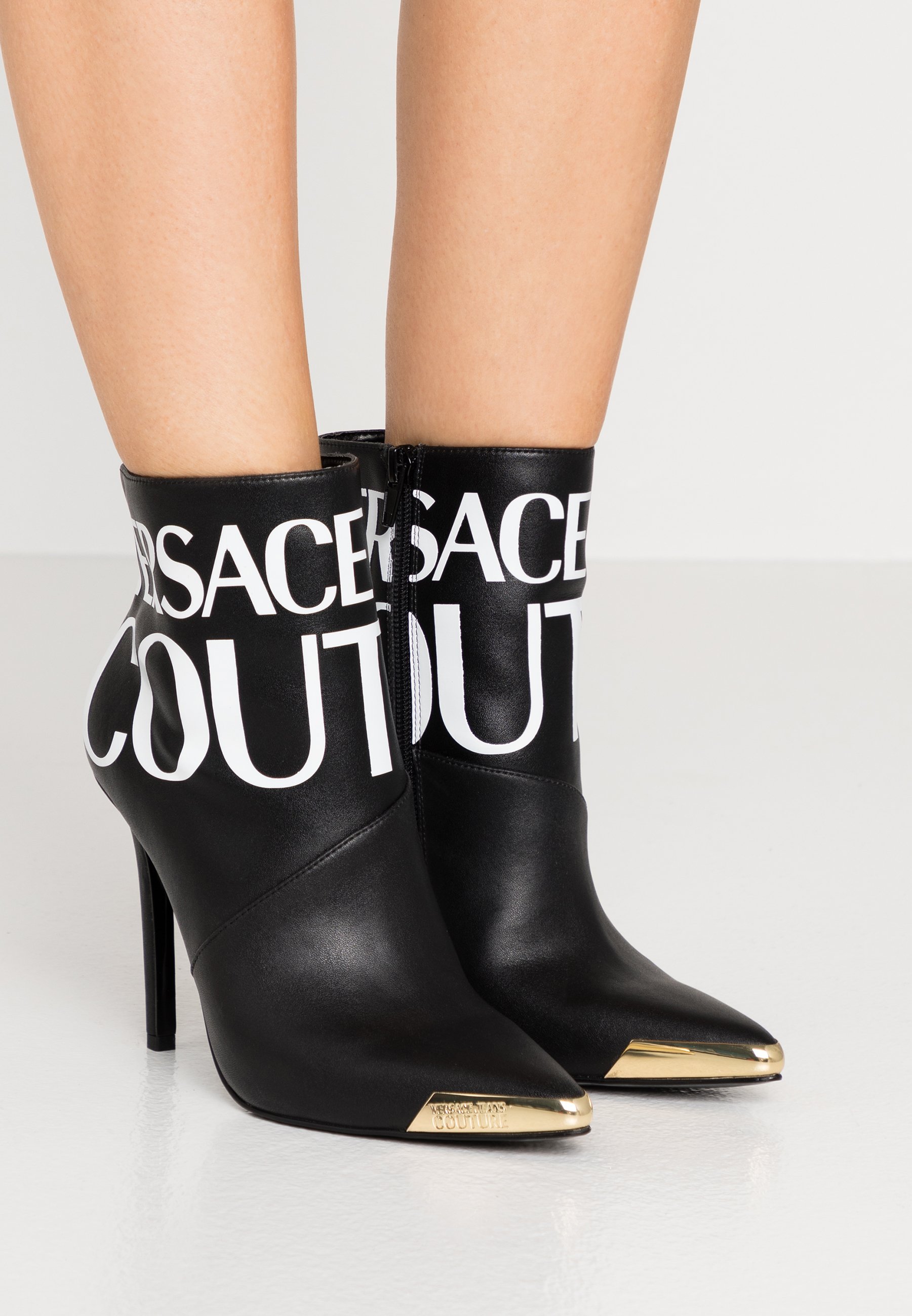 tacchi stile versace