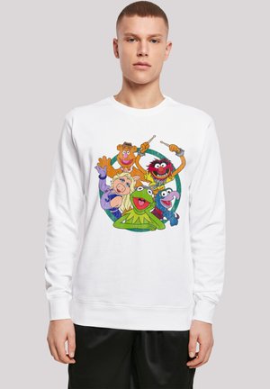 Hvit hettegenser med fargerik grafikk av Muppet-karakterer, inkludert Kermit og Miss Piggy, med en myk tekstur og rund design.