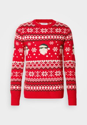 Czerwona dzianinowa sweter z motywami Świętego Mikołaja, płatkami śniegu i wzorami geometrycznymi w kolorze białym i zielonym. Żebrowane mankiety i dół, fason z okrągłym dekoltem.