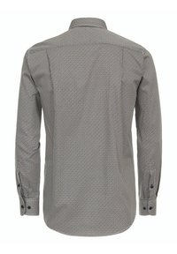 Long-sleeve shirt with a small black and white geometric pattern. Features a classic collar and buttoned cuffs, made from a smooth fabric.