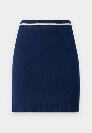 Tummansininen neulottu hame, jossa on muotoiltu malli ja resorivyötärö, jossa on kontrastoiva valkoinen raita. Sujuva pinta, ylempänä polven korkeudella.