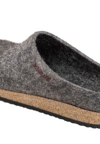 Gray felt slipper with a cork sole, featuring a rounded opening and a small red logo. The texture appears soft and fuzzy.