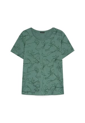 Zielony t-shirt z krótkim rękawem i okrągłym dekoltem, z abstrakcyjnymi czarnymi liniowymi rysunkami kwiatów i twarzy na całej tkaninie.