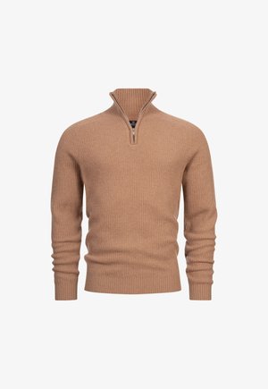 Tan ribbad stickad tröja med kvartdragkedja och åtsittande ärmar. Har en snug midja och texturerad tyg.