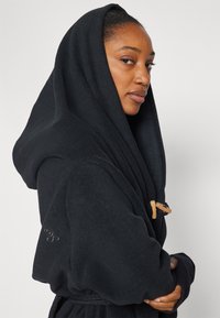 Yogasearcher Jakna od flisa - black