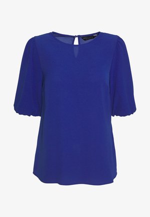 Blusa azul royal hecha de tela ligera. Presenta mangas cortas abullonadas y un detalle de abertura en la parte posterior. Textura suave con un escote redondo.