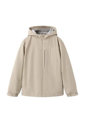 Chaqueta beige claro con capucha, cremallera frontal, puños elásticos y un bolsillo en el pecho. Hecha de tela suave con un acabado ligeramente texturizado.