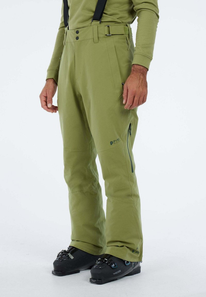 Groene skibroek gemaakt van duurzaam materiaal, met verstelbare bretels, ritszakken en een recht model.