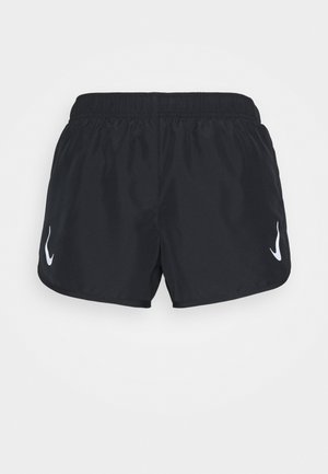 Black sports shorts with an elastic waistband, featuring a white logo on the left side. Made from lightweight, smooth fabric.