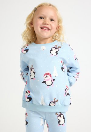 Lyseblå børnesweatshirt og bukser sæt med legende pingvinmønstre, snefnug og julede accenter. Blødt og komfortabelt stof.
