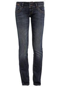 Jean slim bleu foncé avec fermeture à double bouton, poches avant, et légère décoloration sur les cuisses et les genoux.