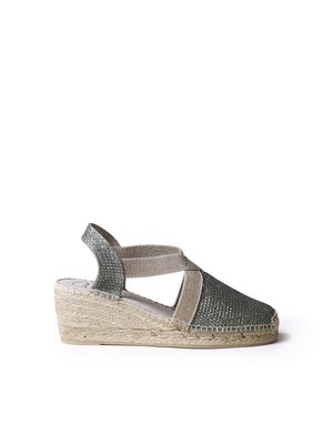 Wedge espadrille sandal featuring a green woven textile upper, beige elastic straps, and a jute rope sole. Closed back design.