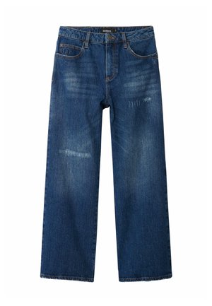 Jeans a gamba larga in denim blu scuro con vita bassa, caratterizzati da una leggera sbiaditura e dettagli strappati, cinque tasche e cuciture in contrasto.