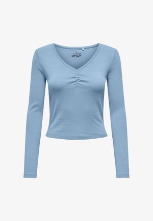 Ljusblå långärmad ribbad topp med V-ringning och veckdetalj mitt fram, figurnära passform.