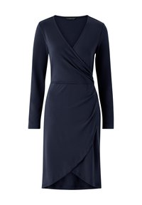 Navyblaues Wickelkleid aus weichem Material. Mit langen Ärmeln, einem V-Ausschnitt und einer gerafften Taillendetails sowie einem drapierten asymmetrischen Saum.