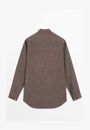 Brown long-sleeve button-up shirt with a classic collar, visible back yoke seam, and buttoned cuffs laid flat facing backward.