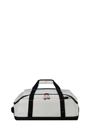 Weißer und schwarzer Reisetasche mit zwei Reißverschlüssen und gepolstertem Griff, ausgestattet mit orangen Reißverschlussanhängern und einer strukturierten Stoffoberfläche.