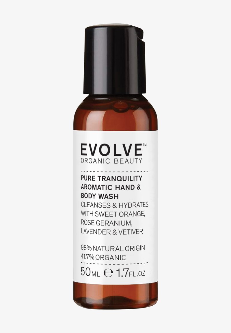 Braune Glasflasche mit schwarzem Pumpspender, weißen Etiketten mit Details und Text, der natürliche und biologische Inhaltsstoffe angibt; 50 ml Fassungsvermögen.