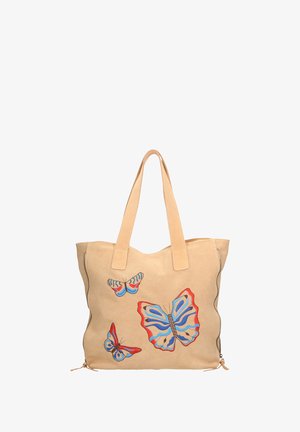Beige suede tote bag with multiple embroidered butterflies in blue, red, and black. Features two sturdy handles and zipper accents.