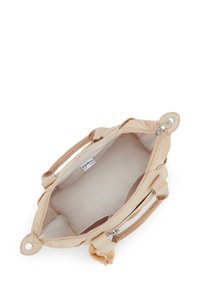 Borsa Kipling beige con cerniera aperta, che mostra l'interno vuoto con due piccole tasche interne e doppie maniglie.