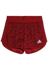 Punaiset urheil shortsit, joissa on kuviollinen kangas, joustava vyötärö ja kontrastisomistus. Mukana pieni valkoinen Adidas-logo sivussa.