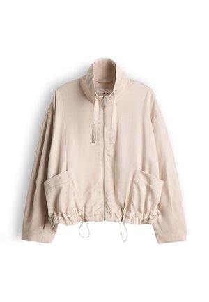 Giacca beige chiaro con cerniera, collo alto, maniche lunghe, grandi tasche frontali e coulisse regolabili all'orlo.