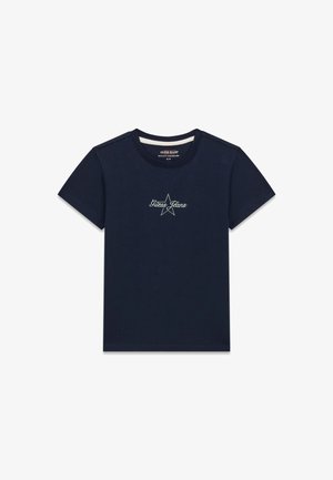 T-shirt di cotone blu navy con maniche corte, scollo rotondo e logo "Guess Jeans" ricamato in bianco all'interno di un disegno a stella sulla parte anteriore.