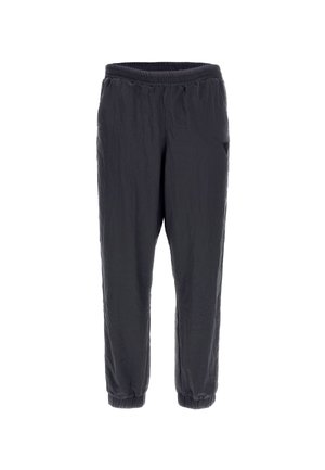 Pantalons de jogging légers en nylon noir avec taille élastique et manches de cheville, poches avant et un logo discret sur la cuisse droite.