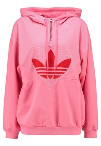 Rosa hoodie med ett strukturerat meshnät och en stor röd treklöverlogotyp. Har en halv dragkedja och ribbade mudd och fåll.