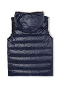 Gilet smanicato trapuntato blu navy con cappuccio attaccato e bordo beige chiaro sui fori per le braccia e sul bordo del cappuccio, mostrato da dietro.