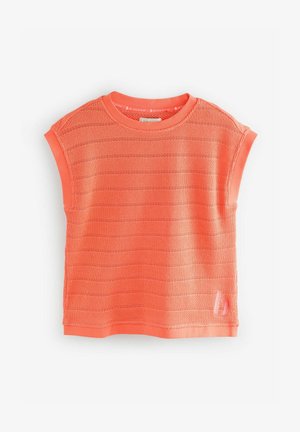 Rövid ujjú, texturált felső élénk korallszínben, bordázott nyakkivágással és logó részlettel az alján. Légáteresztő kötött anyagból készült.