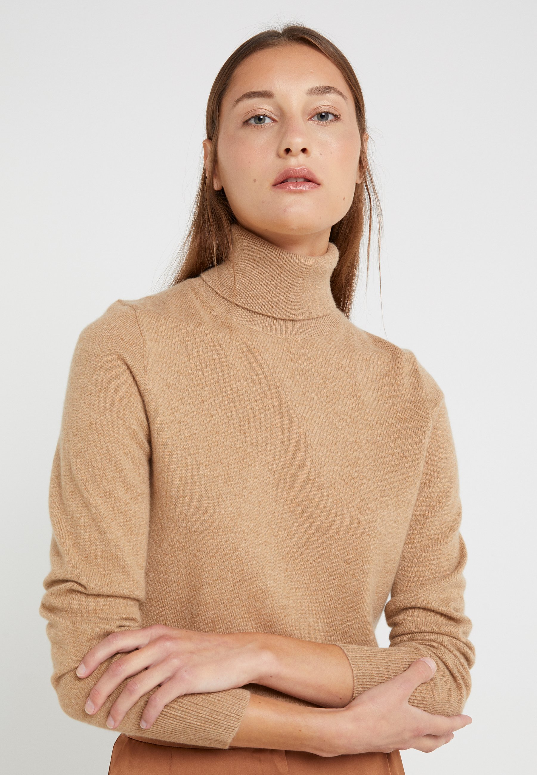 camel turtleneck jumper