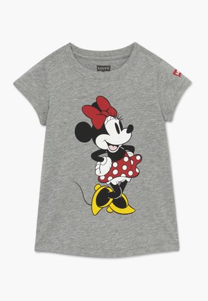 T-shirt gris à manches courtes pour tout-petit avec Minnie Mouse portant un nœud rouge, une jupe rouge à pois et des chaussures jaunes imprimés à l'avant.