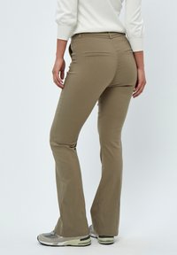 Minus MICARMA FLARED PANTS - Broek - mineral gray