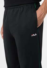 Fila SAGANO REGULAR - Träningsbyxor - black