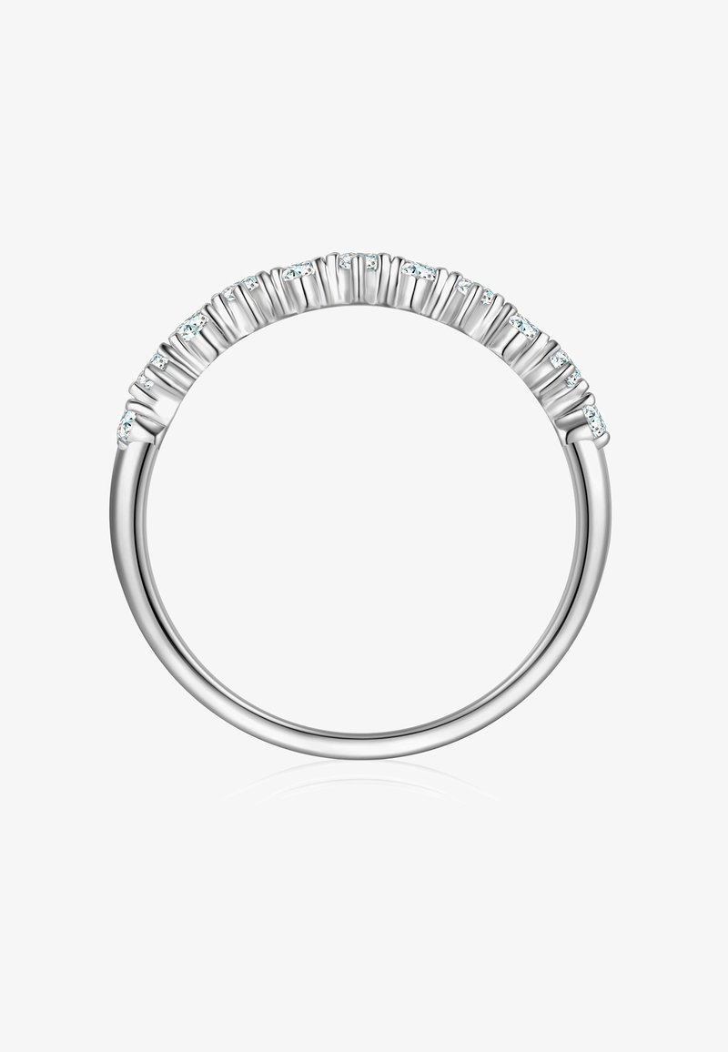 Sudraba gredzens ar izliekamu joslu, kas rotāta ar mazām, nejauši novietotām, spīguļojošām caurspīdīgām akmeņiem gar augšējo malu. Gluda tekstūra.