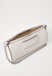 Light gray leather clutch bag with a silver chain strap, zip closure, and a logo plaque on the front. Interior features a tan lining.