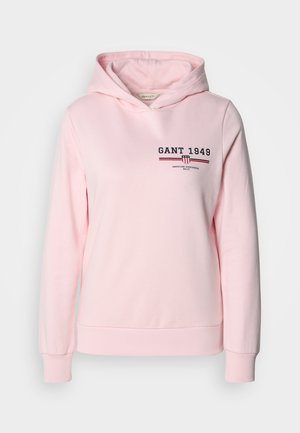 Felpa rosa realizzata in misto cotone, con logo frontale e righe orizzontali. Presenta un cappuccio con coulisse e polsini e orlo a costine.