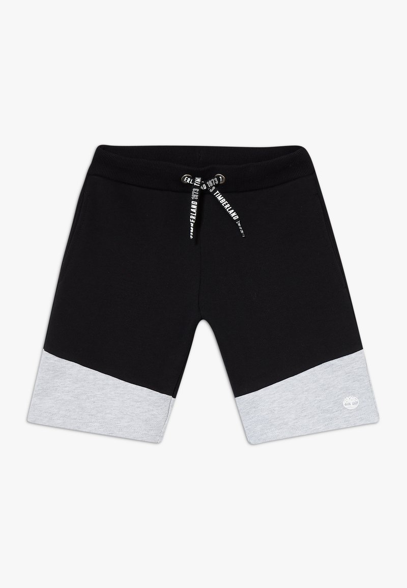 Mustat verkkarihousut, joissa on harmaa alaosa, joustava vyötärönauha ja kiristysnyöri, jossa on painettu brändäys; pehmeä kangaspinta.