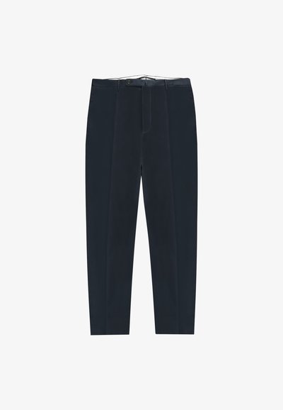 Pantalons ajustés bleu marine en tissu lisse avec un devant plat, coupe slim et deux poches latérales. Comprend une fermeture éclair et des passants de ceinture.