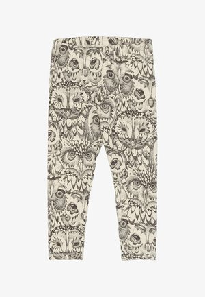 Pėdkelnės su pelėdų raštu, pagamintos iš minkštos medžiagos. Yra sudėtingi juodi įvairių pelėdų piešiniai ant šviesiai kreminio fono.