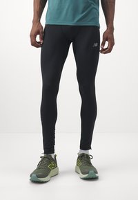 New Balance SLEEK REFLECIVE TIGHT - Leggings - black