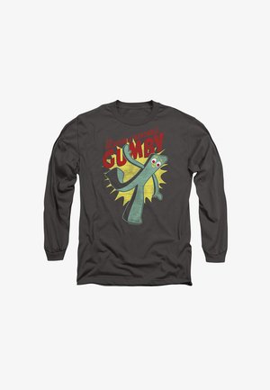 Schwarz Langarmshirt mit einer Cartoonfigur von Gumby in Grün und rot akzentuiertem Text, der "Der unglaubliche biegbare Gumby" liest.