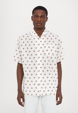 Short-sleeve white shirt with a colorful floral pattern, featuring a single pocket on the left chest and a relaxed fit design.