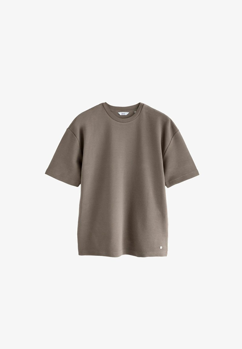 Khaki short-sleeved t-shirt made of textured fabric with a round neckline and a small logo detail at the bottom left hem.