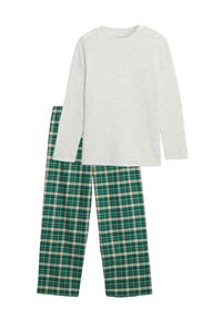 Szara bluzka z długim rękawem w połączeniu z zielonymi i kremowymi spodniami w kratę. Bluzka ma prosty okrągły dekolt; spodnie mają elastyczny pas.