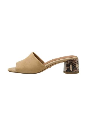 Beige suede open-toe mules with a block heel featuring a snakeskin pattern. The heel is textured with a glossy finish.